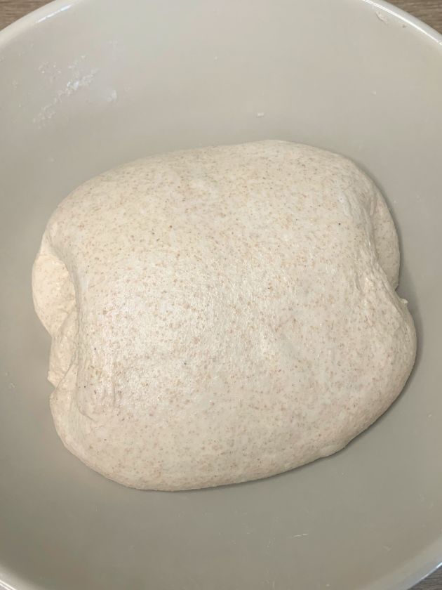 Wholewheat sourdough in a porcelaine bowl after 3 sets of coil folds.