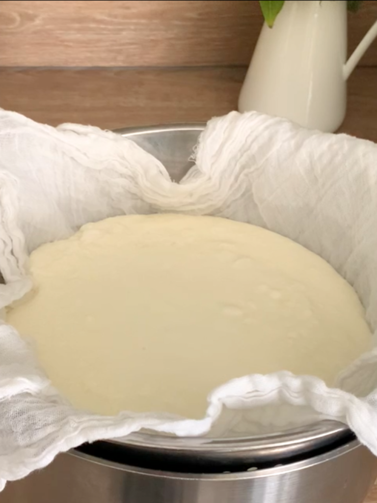 Draining homemade yogurt to make greek yogurt