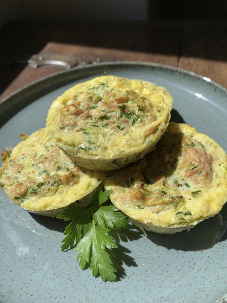Tuna and egg muffins on a blue plate