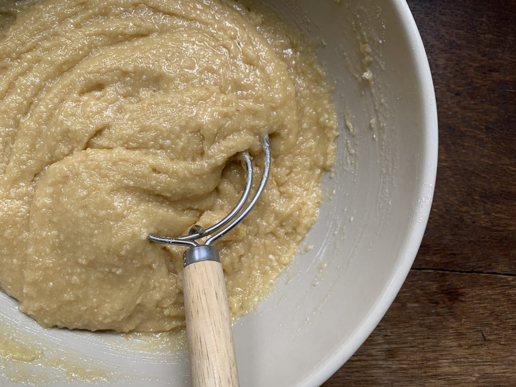 Gluten free apple cake batter in a bowl