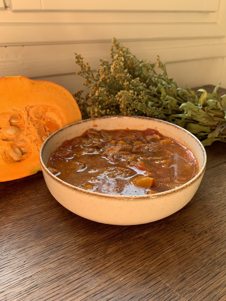 Autumn Pork Goulash Stew Recipe with onion squash and dried flowers