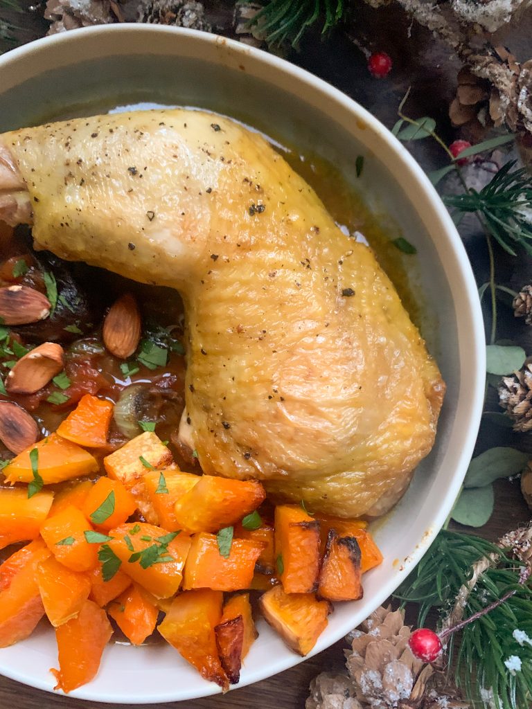 Christmas chicken tagine with prunes and apricots served with roasted butternut squash the chicken has nicely grilled skin