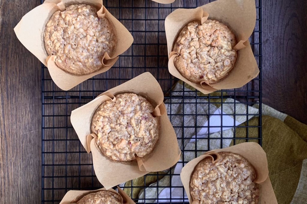 Sourdough Apple Oat Muffins on a cooling rack