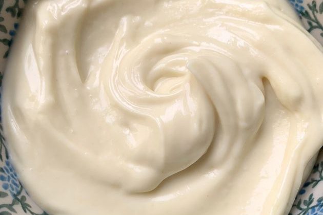 Homemade mayonnaise with avocado oil immersion blender recipe in a small blue flower bowl