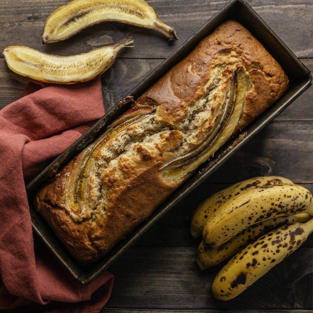 Banana bread from above with ripe bananas